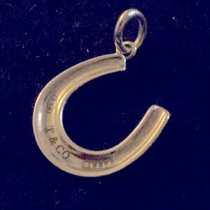 Authentic Tiffany & Co 925 sterling silver horse shoe charm in great condition